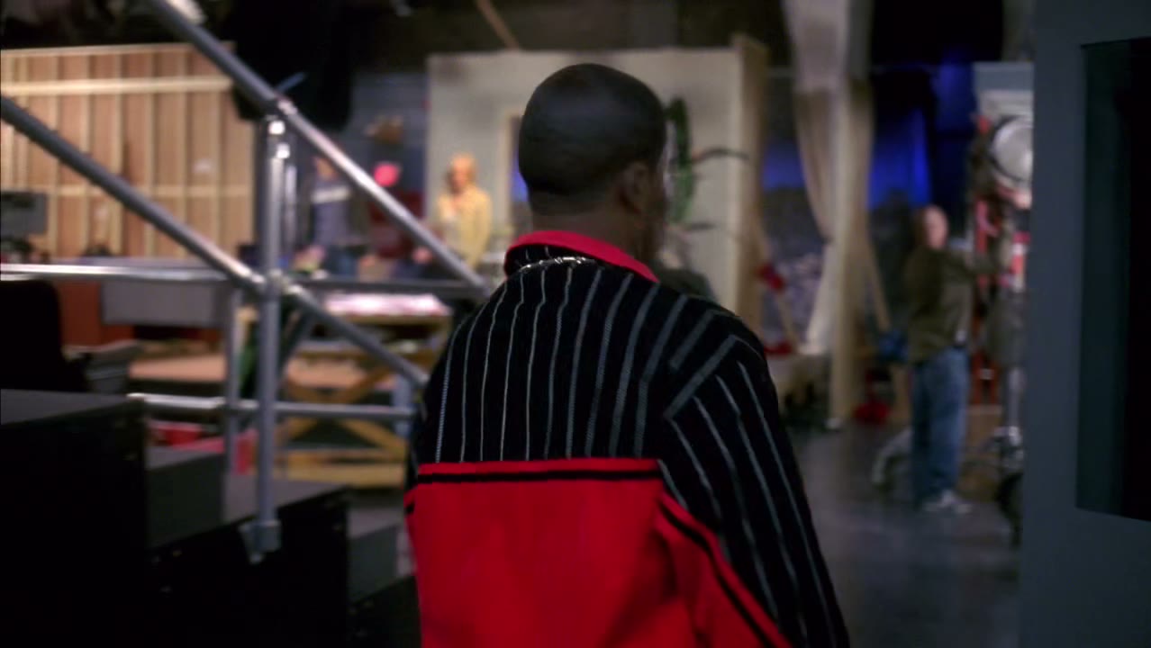 [Woman over P. A.] Tracy Jordan to the stage, please.