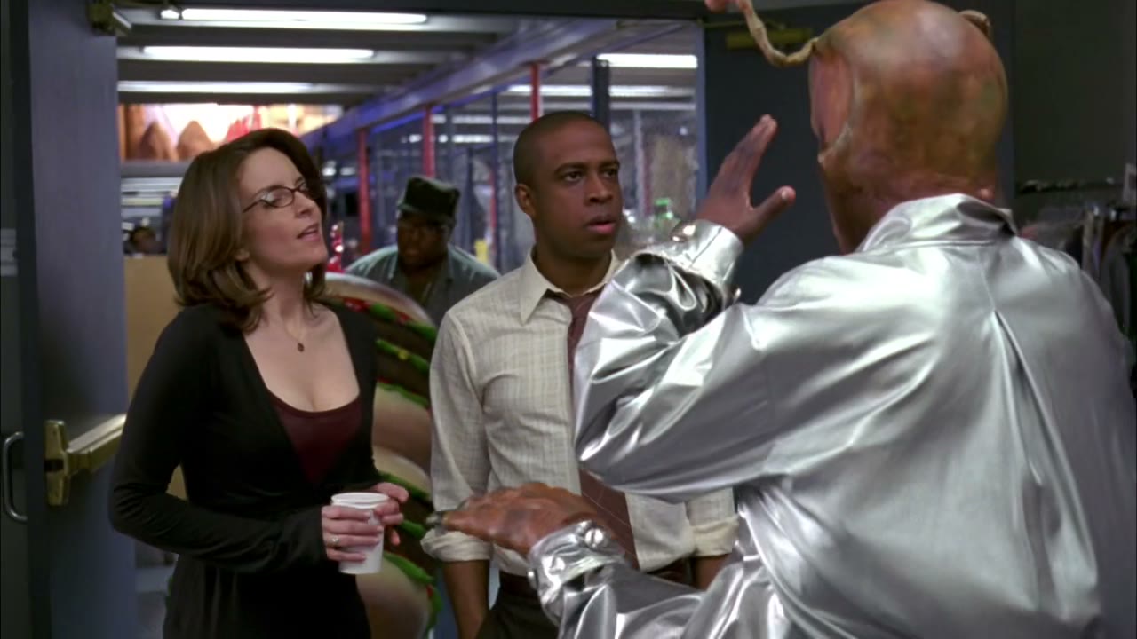With a black comedian wearing a dress.