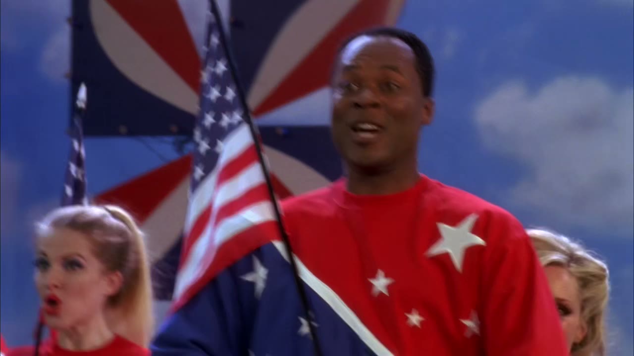[Rock anthem plays]
