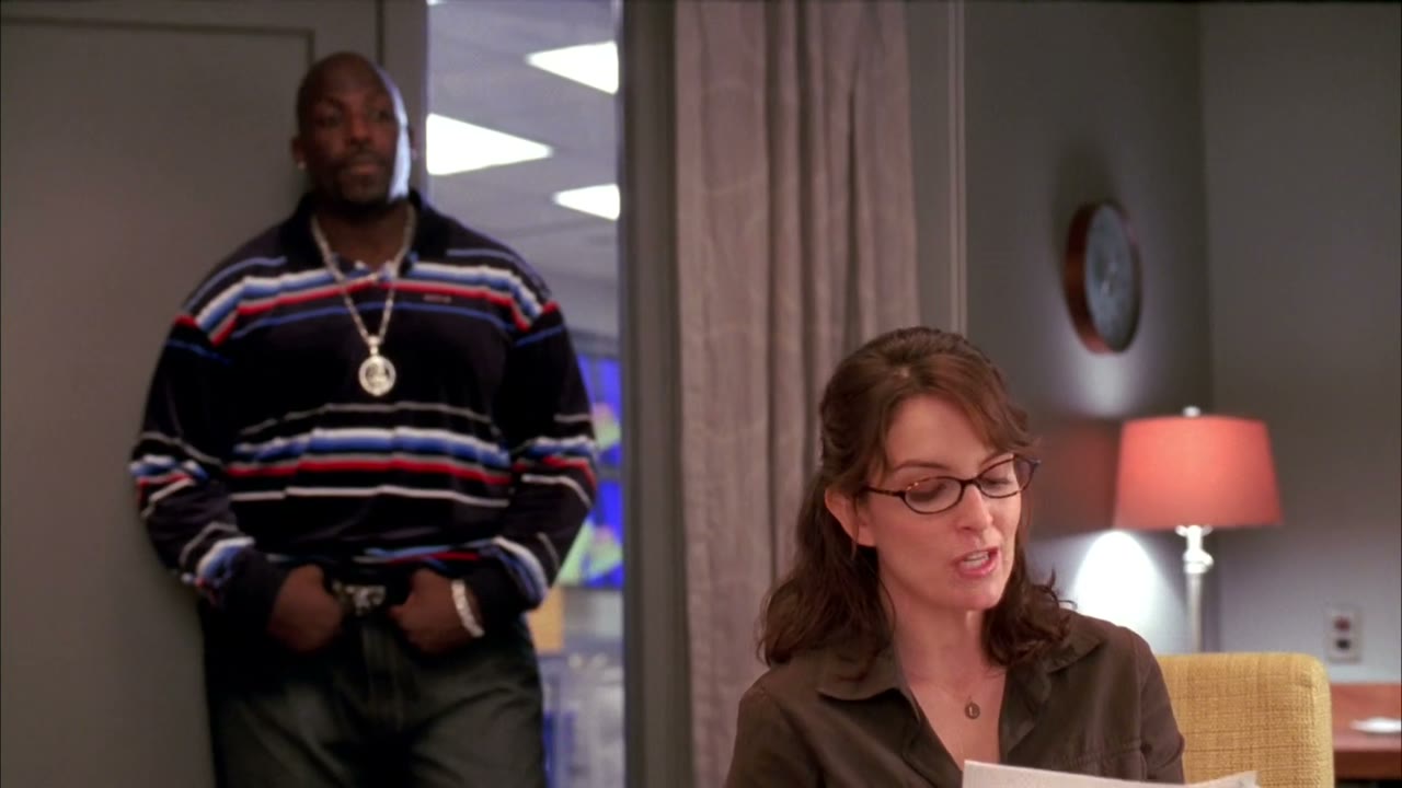 In the opening sketch this week, Tracy is a bank robber...