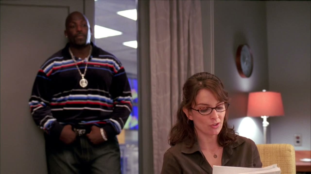 In the opening sketch this week, Tracy is a bank robber...
