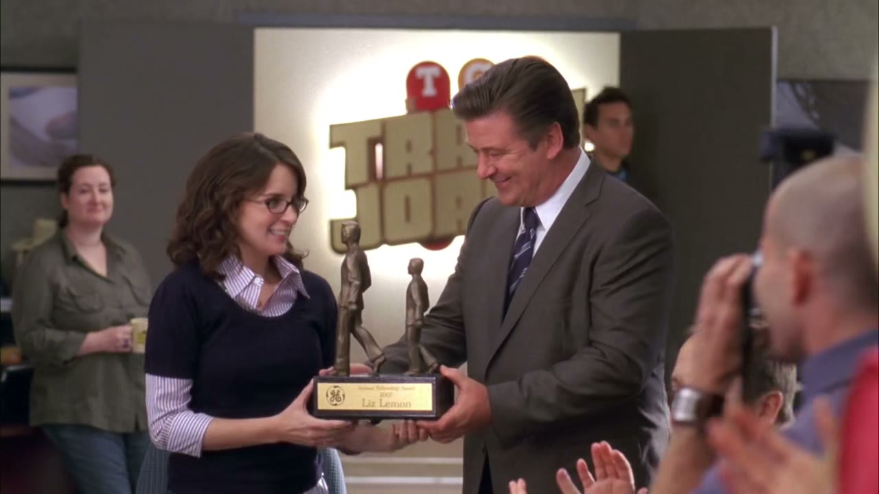 Wait, how could liz win a fellowship award?