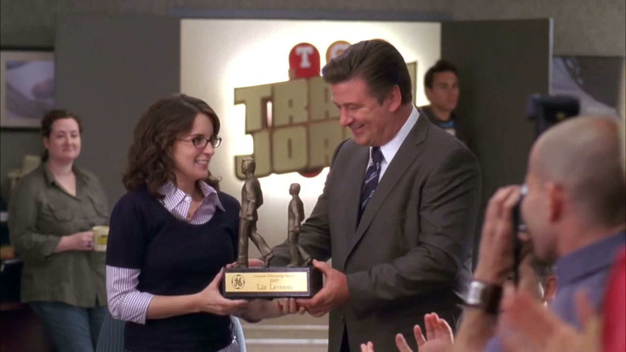 Wait, how could liz win a fellowship award?
