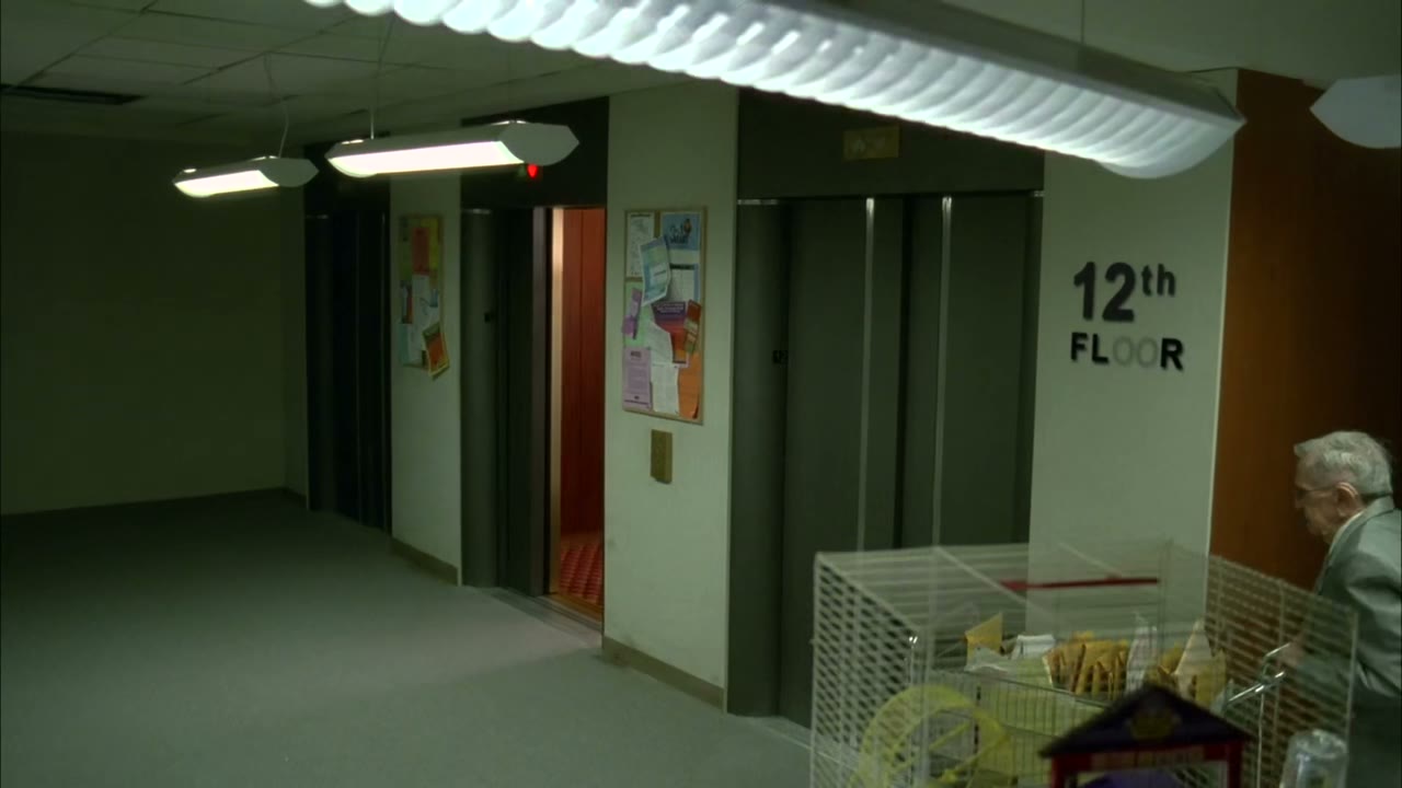 [Elevator bell dings]