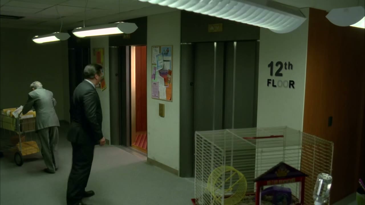 [Ding][mechanical female voice] door closing.