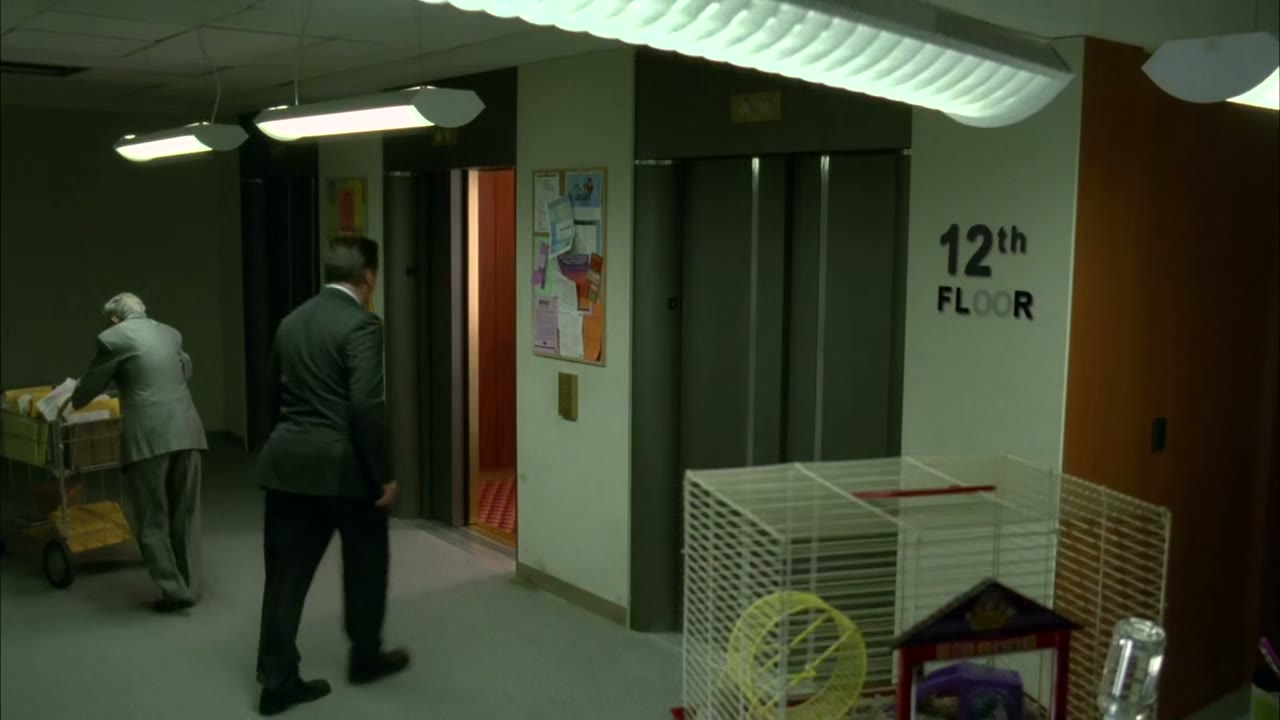 [Ding][mechanical female voice] door closing.