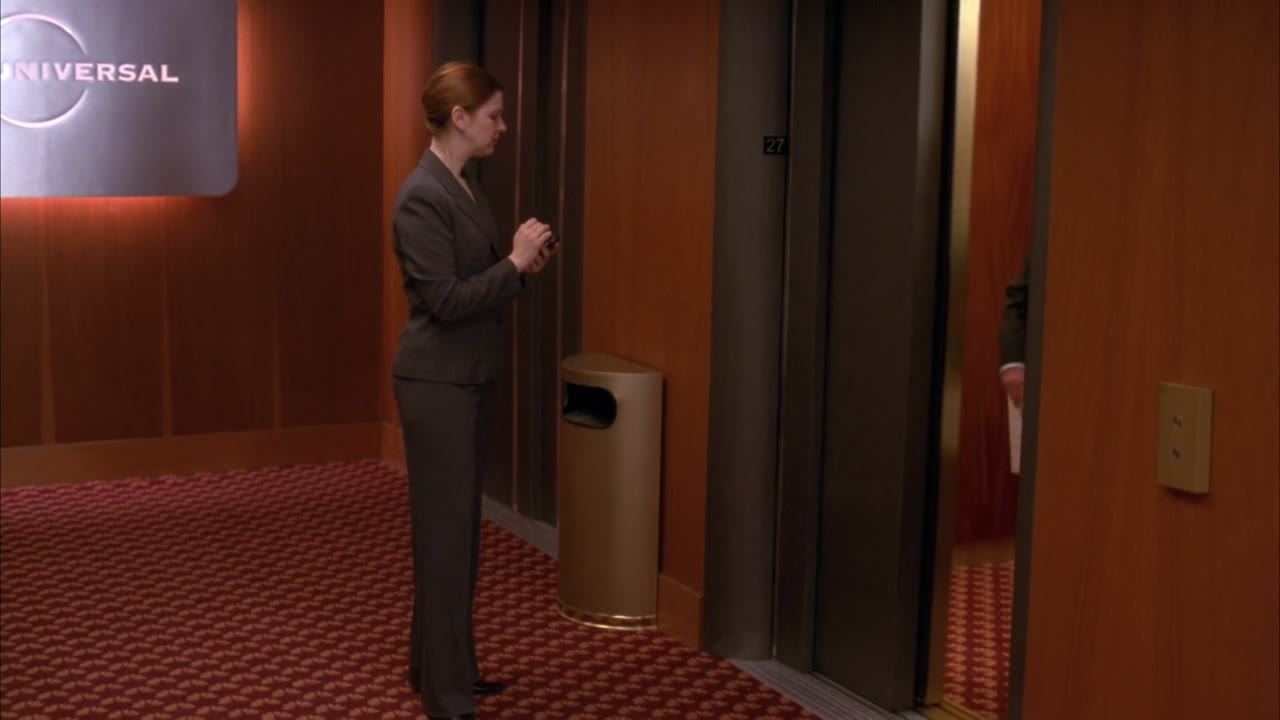 [Elevator pings]