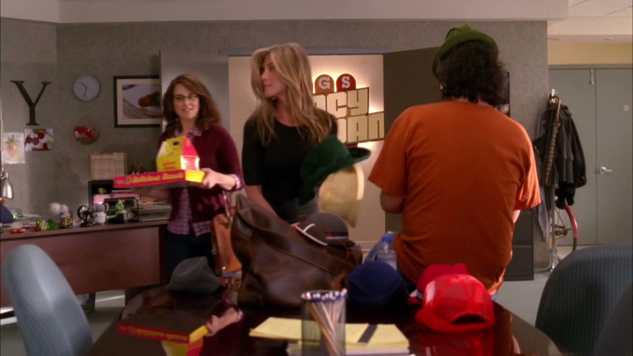 Hey! You're selling hats in the office!