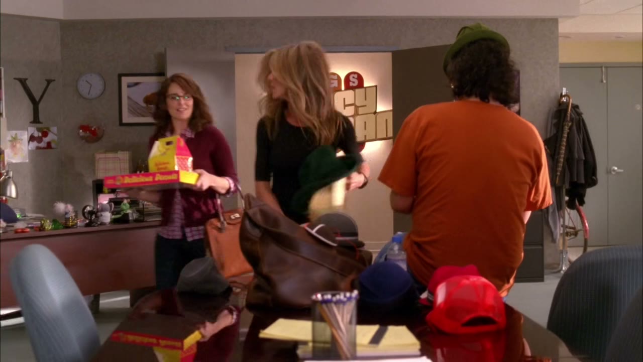 Hey! You're selling hats in the office!