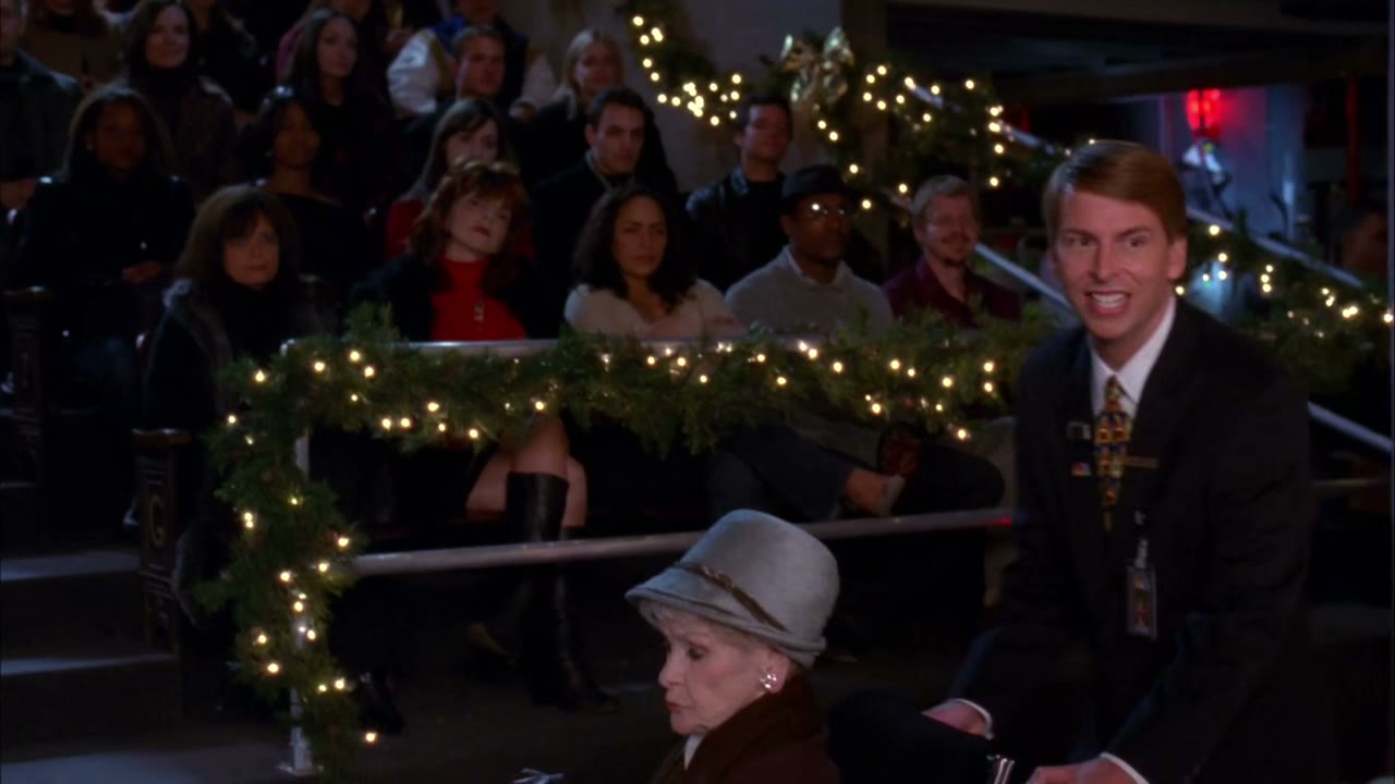 ♪ Yuletide carols being sung by a choir ♪