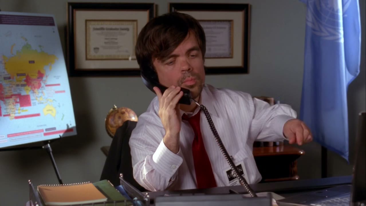 [Imitates automated voice] please hold.