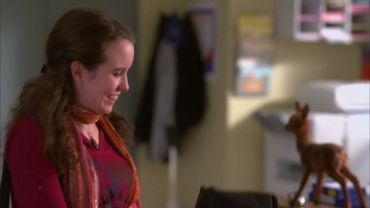 What is she doing here?