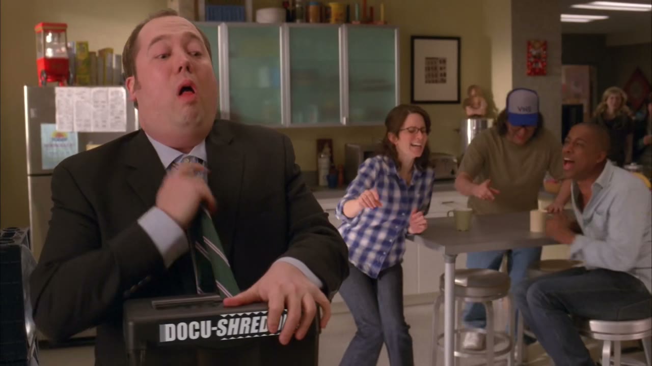 - his tie caught in the shredder!