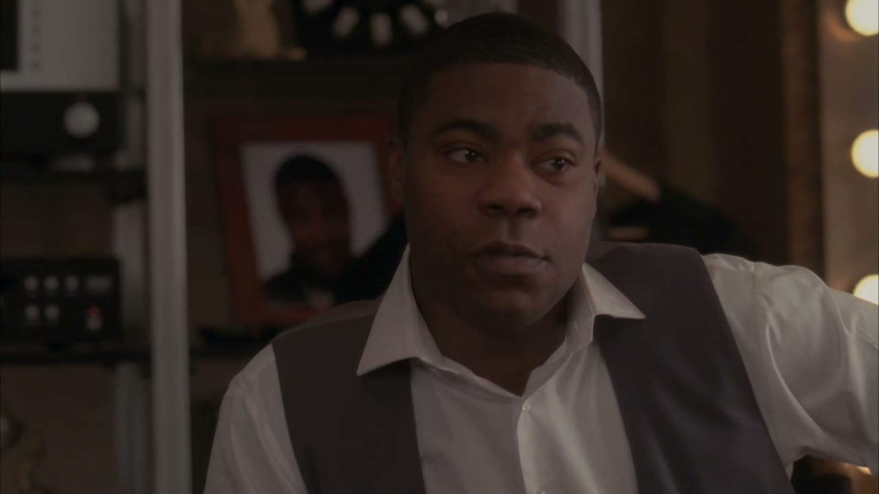 A Slovin Shield commercial with a black burglar.