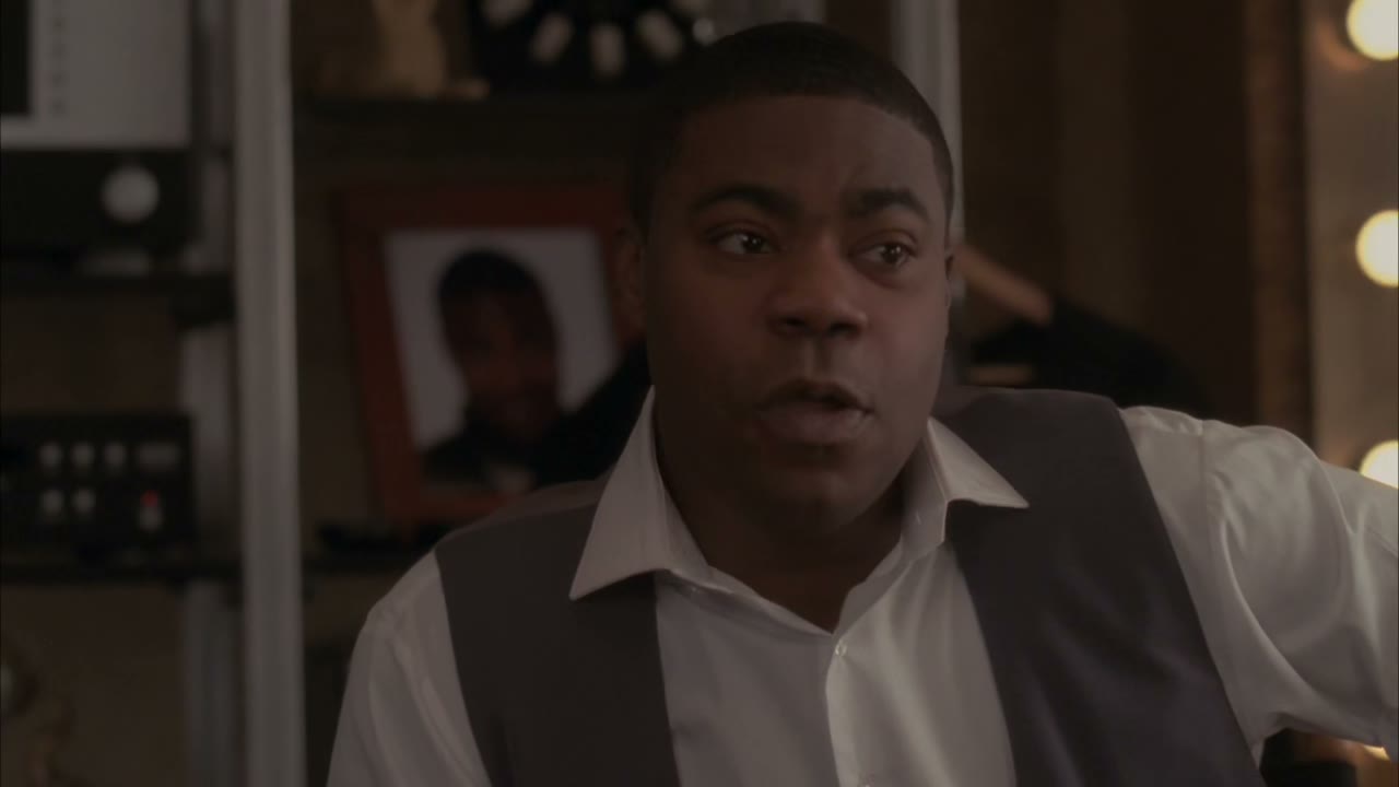 A Slovin Shield commercial with a black burglar.
