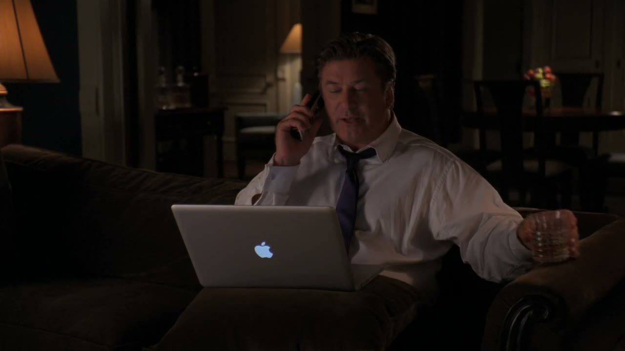 Where he is drinking scotch and playing snood.