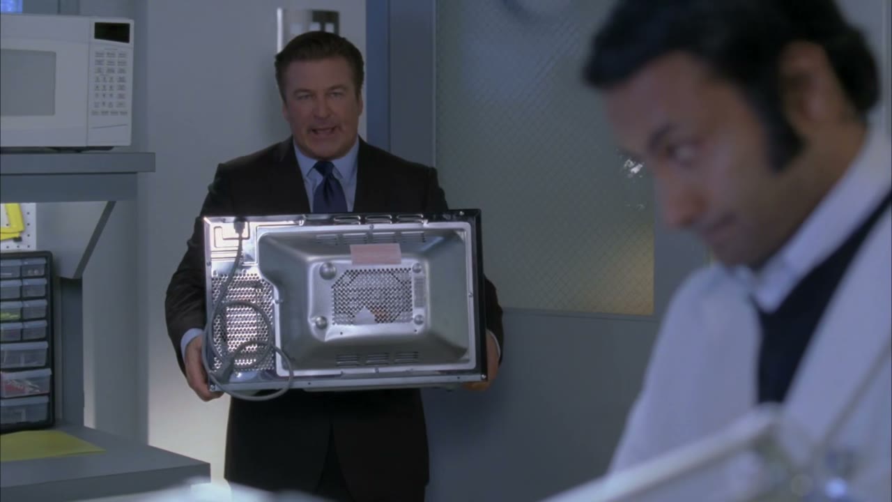 I'm wearing a suit and carrying a microwave.