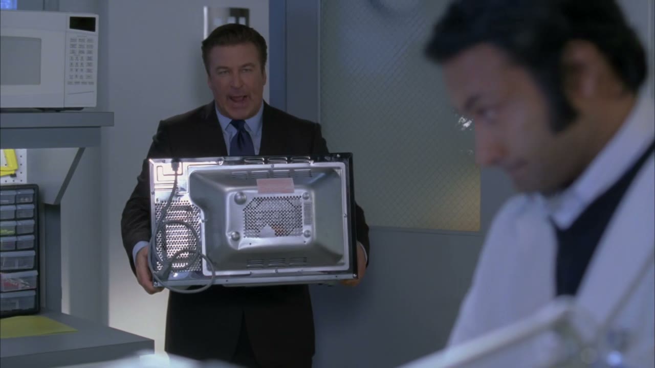 I'm wearing a suit and carrying a microwave.