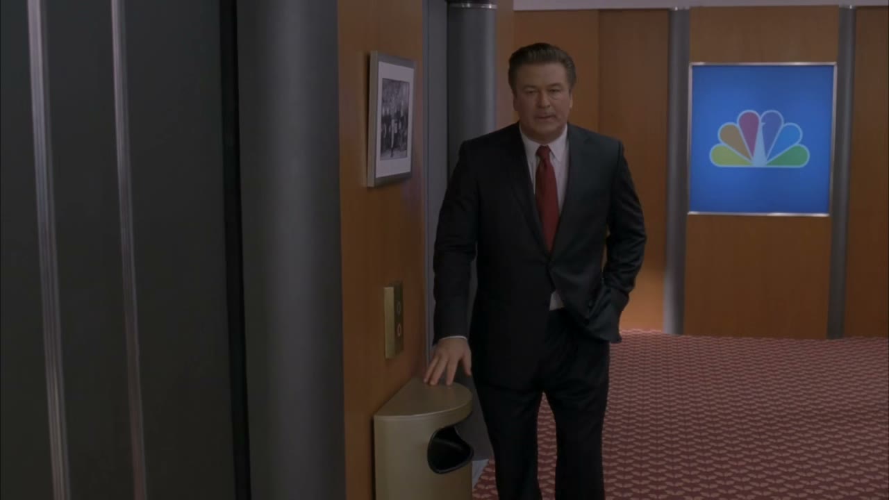 [Elevator bell dings]