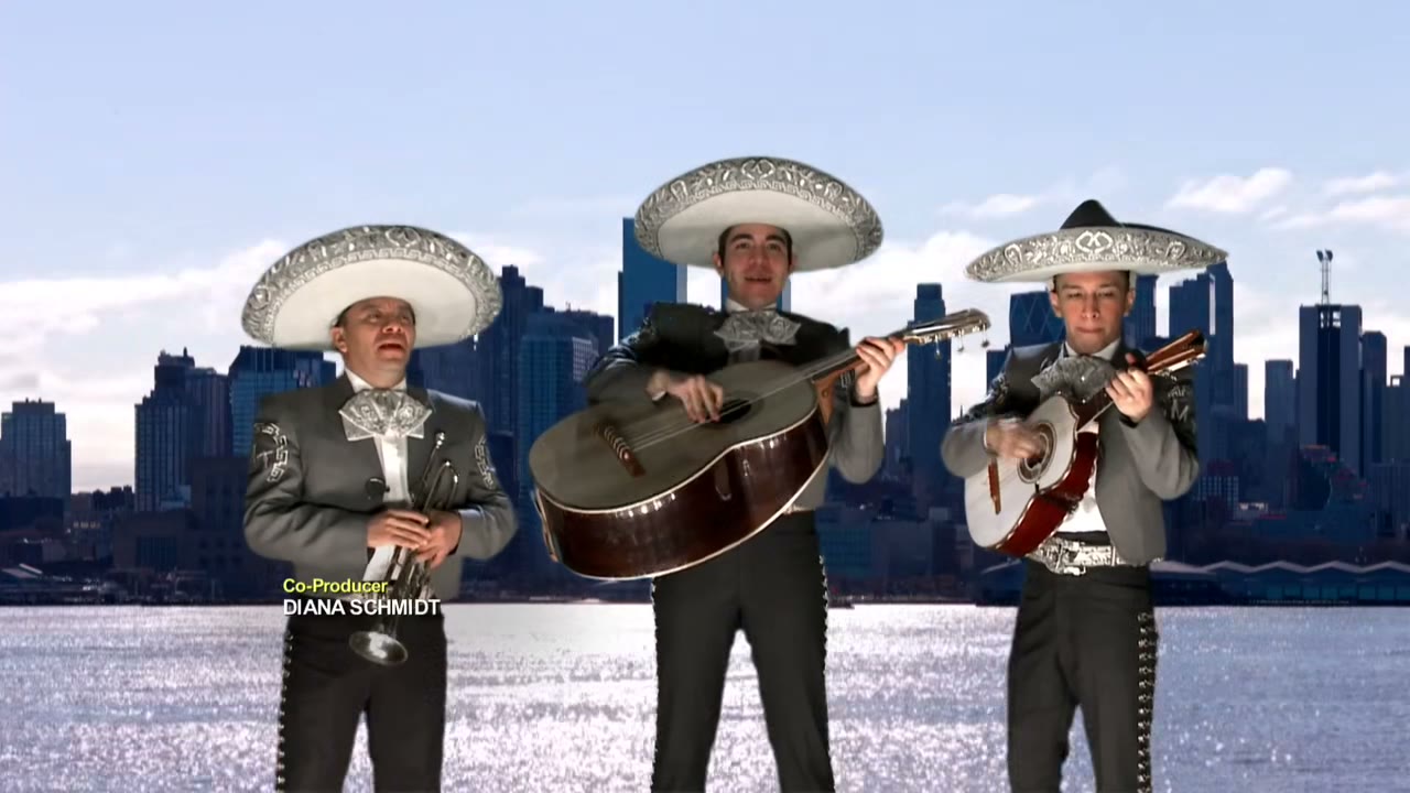[Mariachi music]