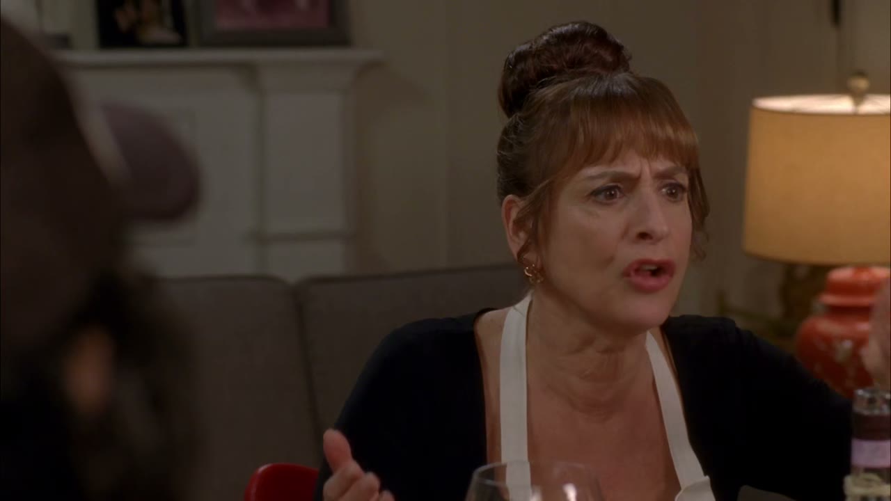 You're sitting at dinner next to a beautiful older woman.