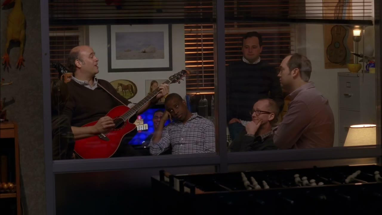 - ♪ Sing us a song, you're the guitar man ♪