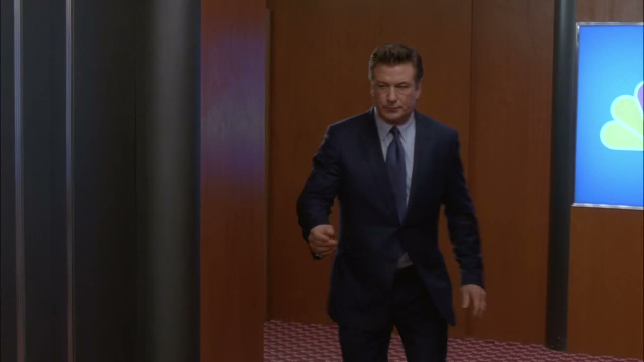 [Elevator dings]
