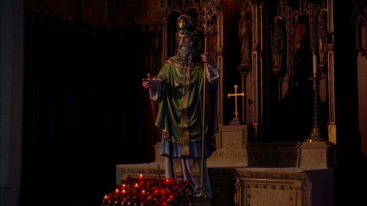 [Solemn music playing]