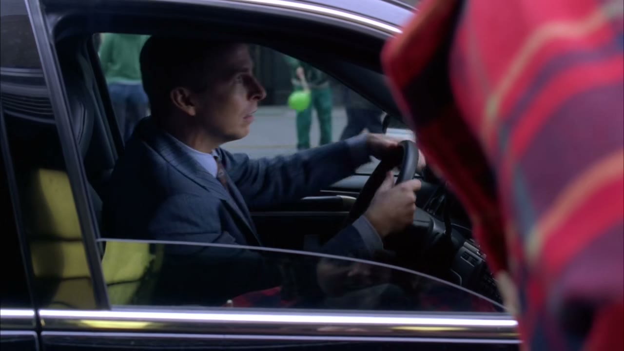 - [over megaphone] move your car.