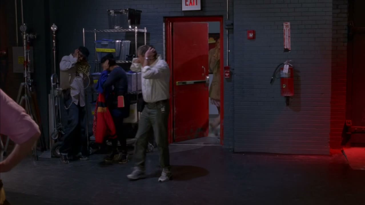 [Alarm blares]