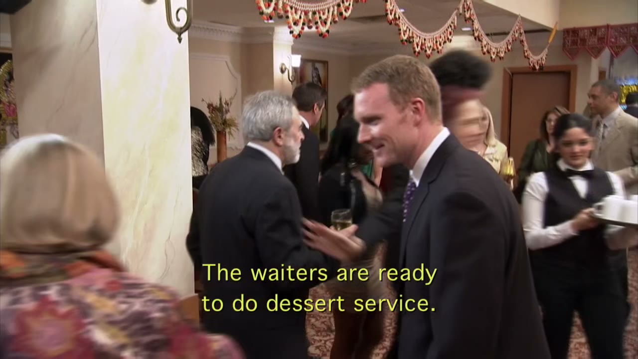 The waiters are ready to do dessert service.