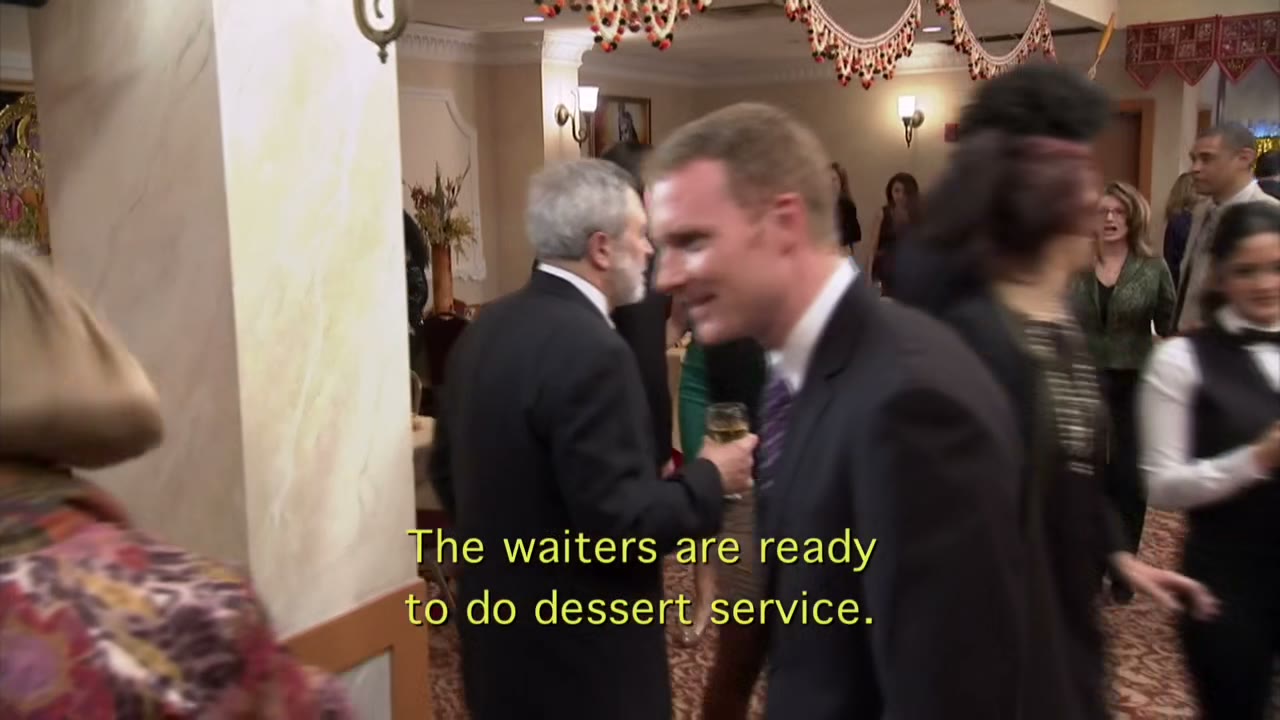 The waiters are ready to do dessert service.