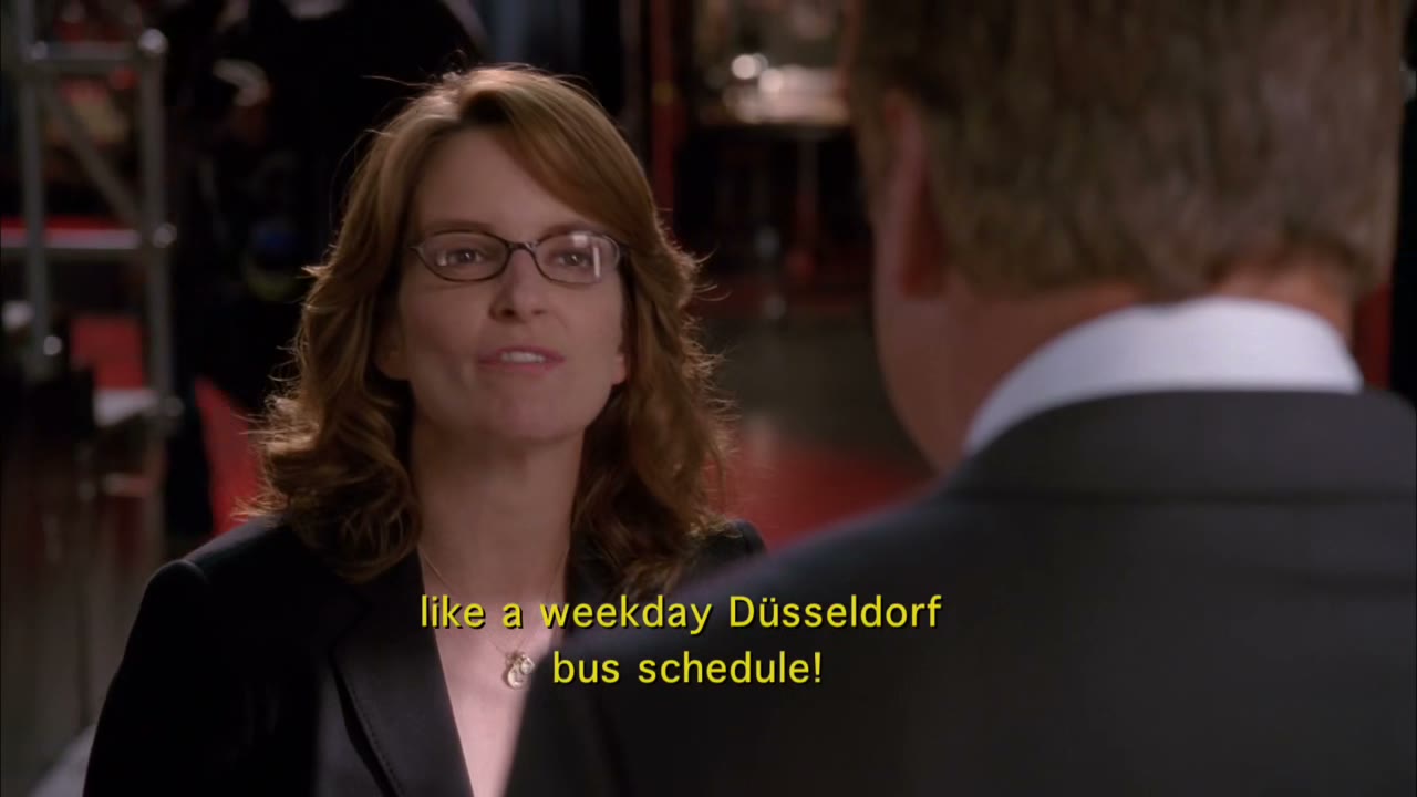 [Speaking German]