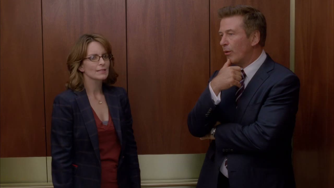[Elevator dings]