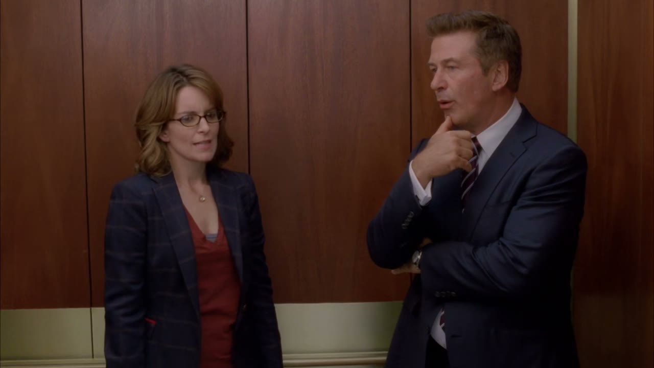 [Elevator dings]