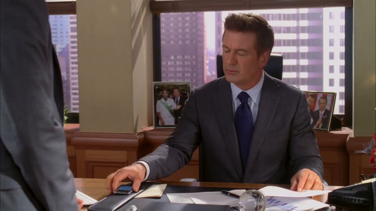 [Cell phone buzzing]