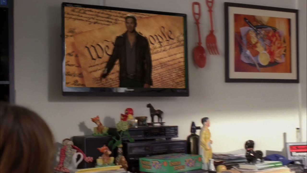 [Cheering on TV]