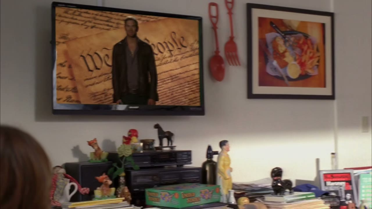 [Cheering on TV]