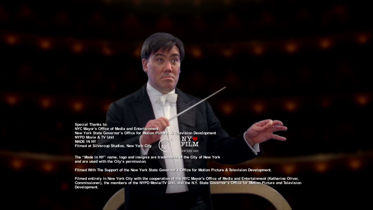 [Orchestra pauses]