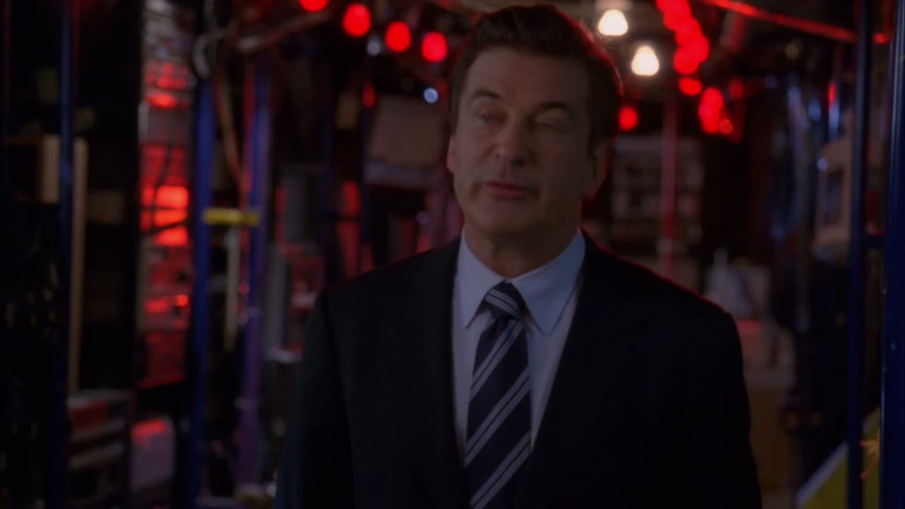 In a janitor's uniform.